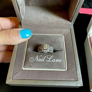 Neil Lane bridal set. Engagement ring with 2 bands. Custom prong setting.